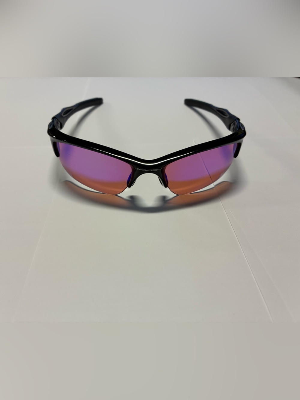Oakley Black Frame Sunglasses with Purple-Orange Mirrored Lenses
